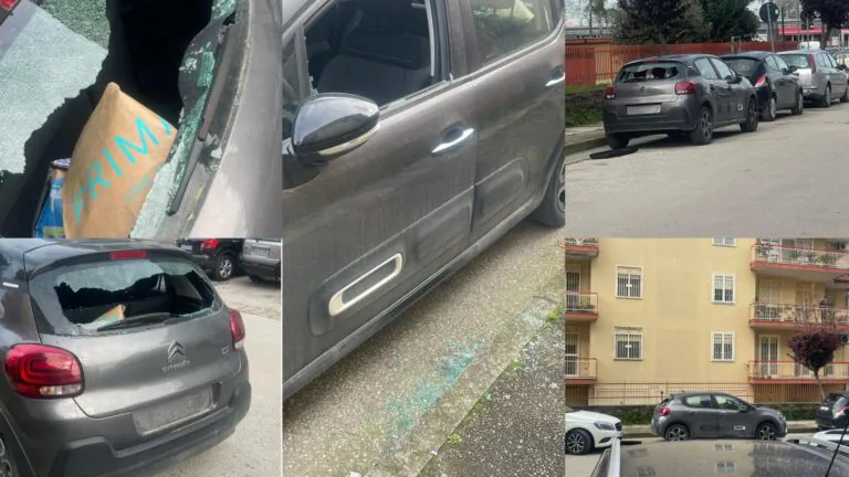 Macchina sospetta con vetri sfondati parcheggiata sulla strada principale
