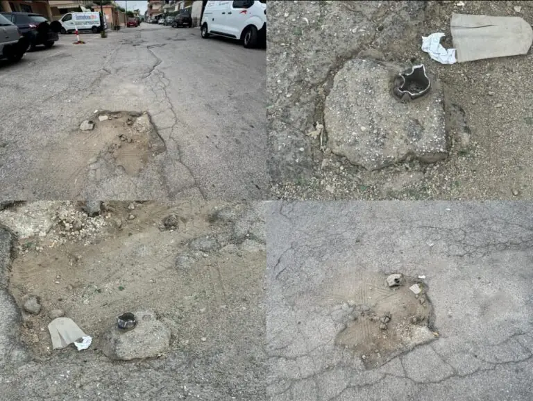 Buca con spuntone affilato nella zona dei negozi: automobilisti forano le gomme