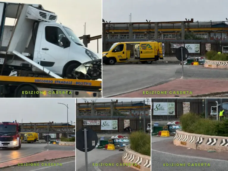 Furgone si ribalta sulla rotonda, conducente ferito e carico disperso sulla strada