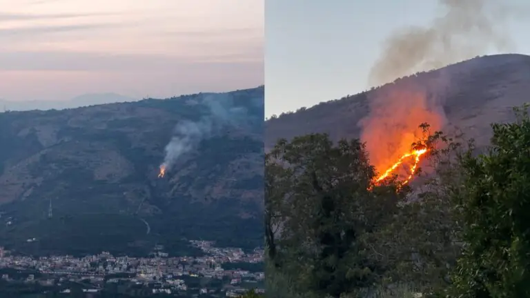 Monte della valle in fiamme, fumo visibile da lontano